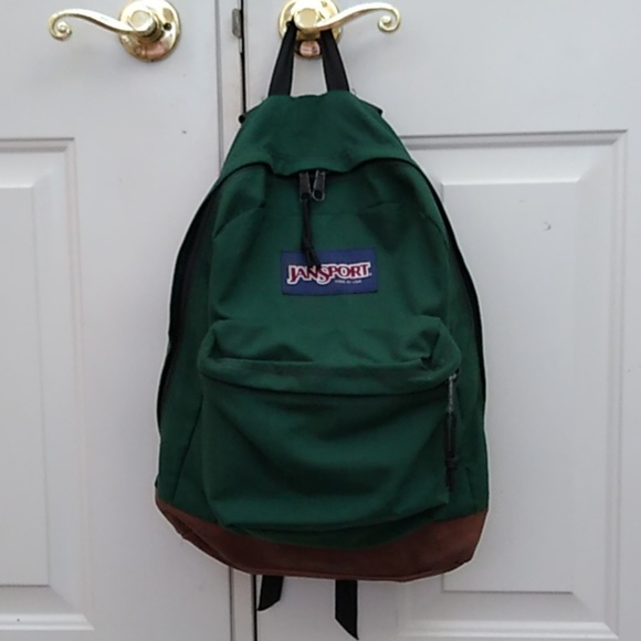 green jansport backpack leather bottom